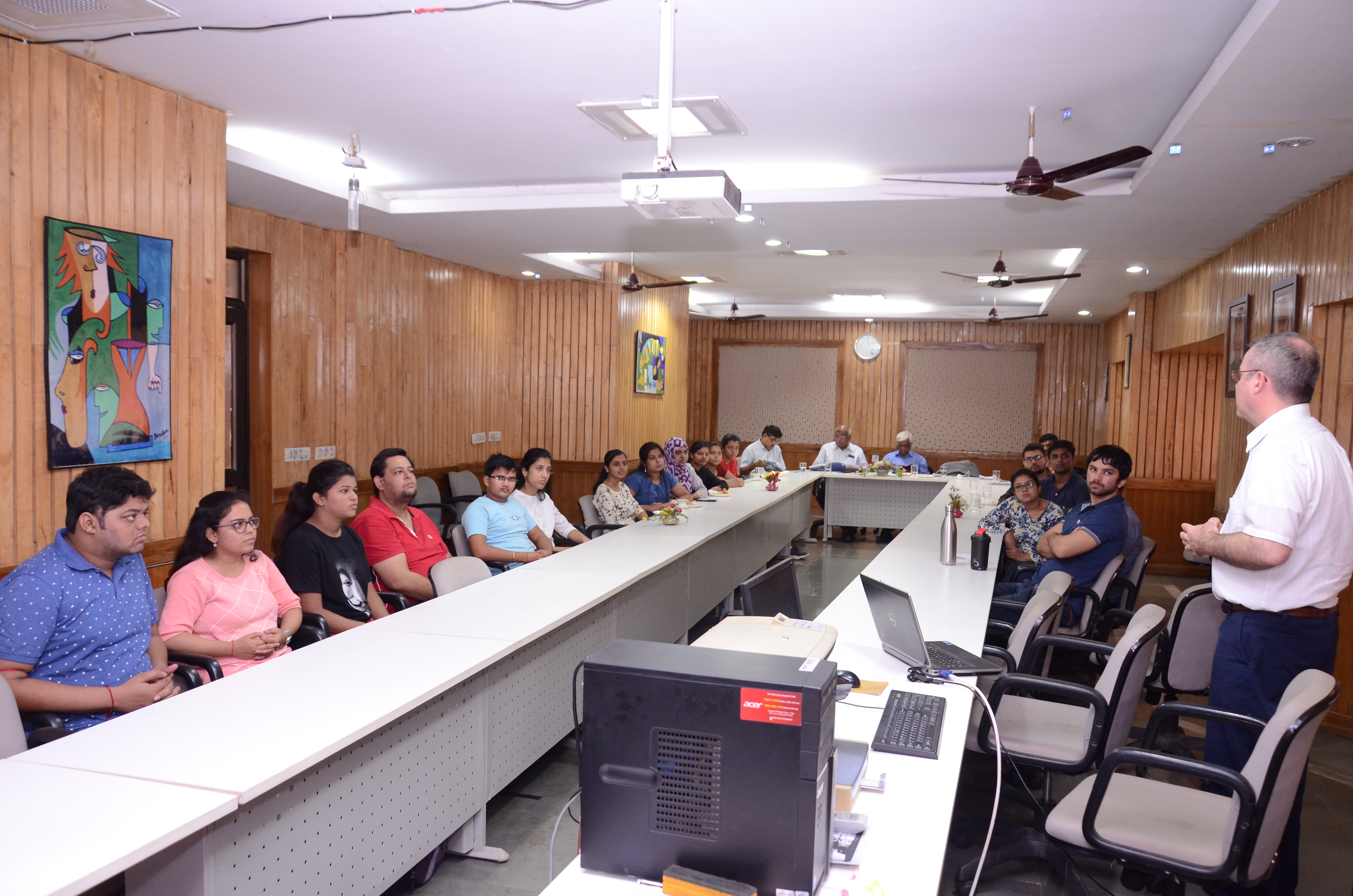 persons sitting in conference room